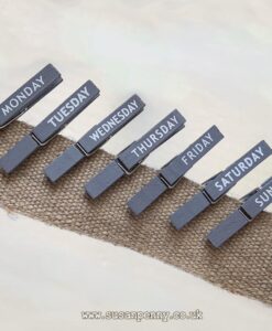 grey painted clothes pegs